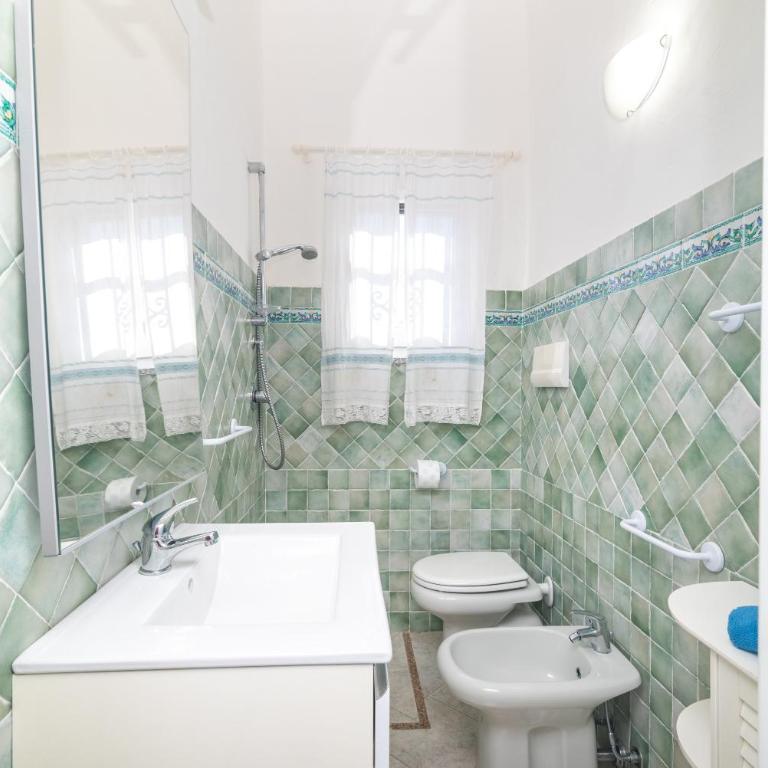 Bilocale Bianco Tamerici - One-Bedroom Apartment with Garden View - 11