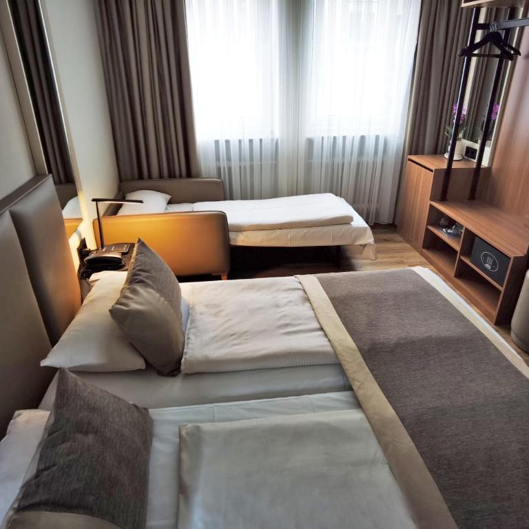 Hotel Italia - Dreibettzimmer - 24