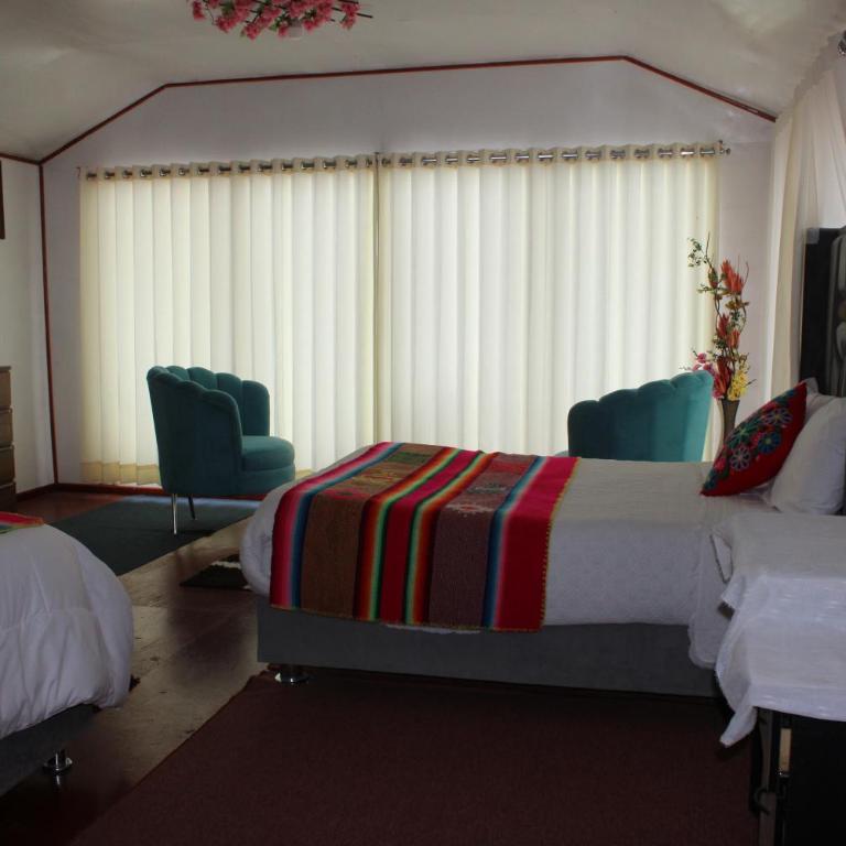 Uros Titicaca Star - Habitación con cama extragrande y vistas al lago - 10