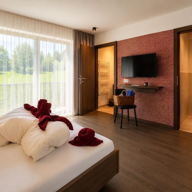 Der Kaerntnerhof am Weissensee, SeeHotel & SeeApartments direkt am See - Doppelzimmer mit Gartenblick - 1