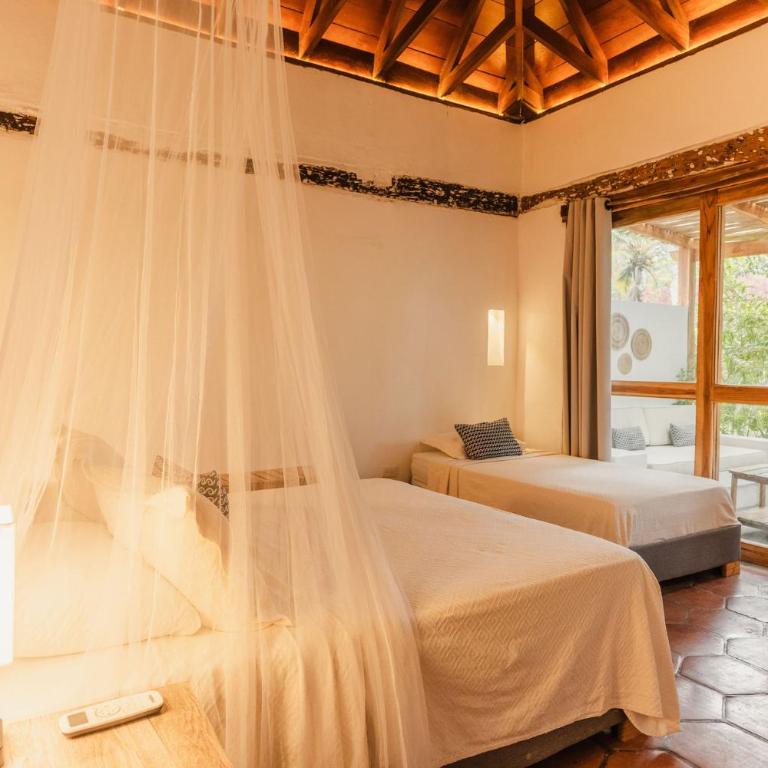 Ecohotel Raices del Rosario - Triple Room with Terrace - 5