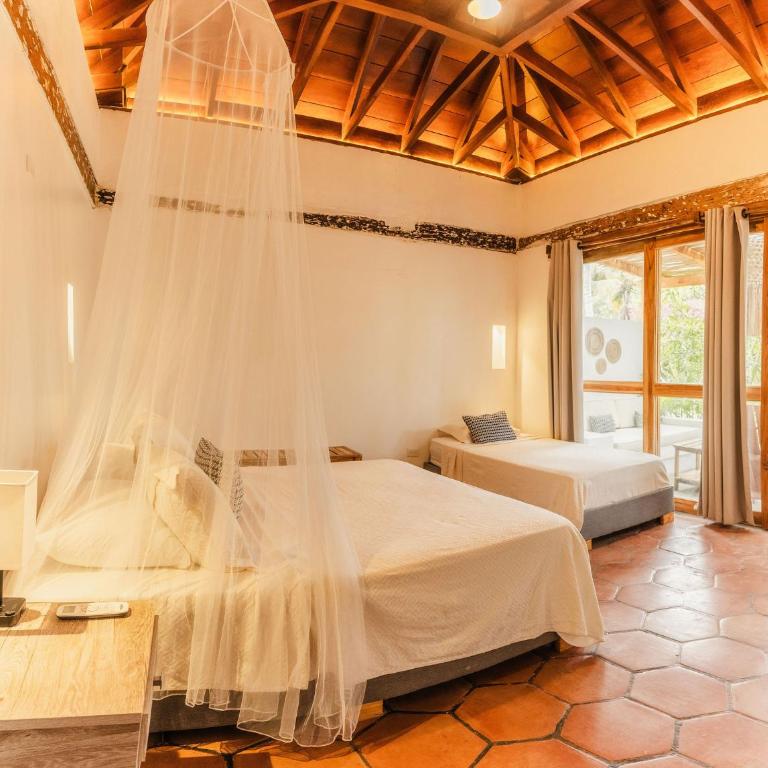 Ecohotel Raices del Rosario - Triple Room with Terrace - 8