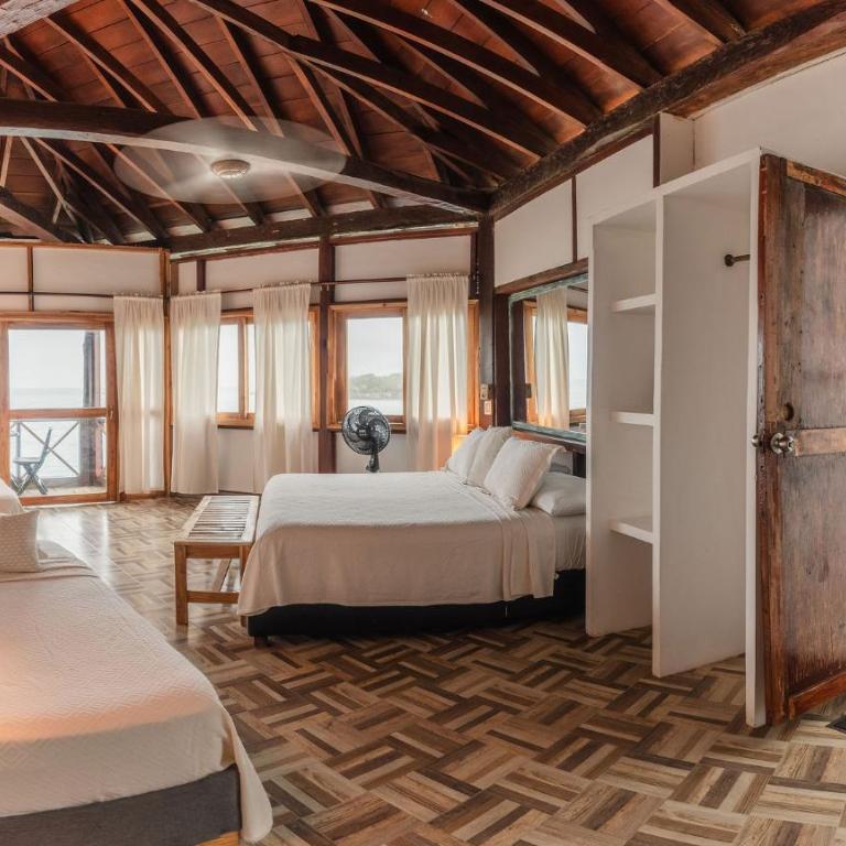 Ecohotel Raices del Rosario - Quadruple Room with Sea View - 2