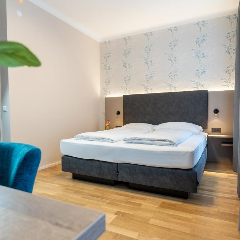 Das Jedermann Boutiquehotel mit Stadtgarten - Superior Doppelzimmer mit Gartenblick - 6