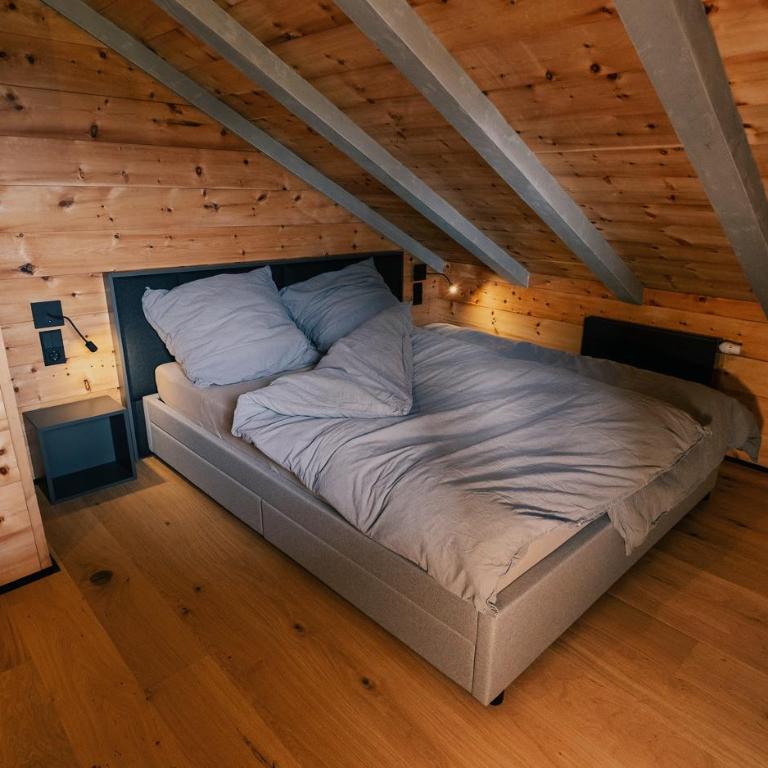Luxus Suite mit Zirbensauna, Alpenblick und Pool - Deluxe-Apartment mit 2 Schlafzimmern und Gartenblick - 7