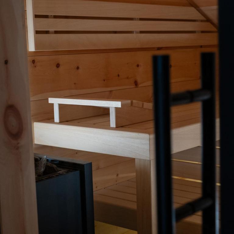 Luxus Suite mit Zirbensauna, Alpenblick und Pool - Deluxe-Apartment mit 2 Schlafzimmern und Gartenblick - 23