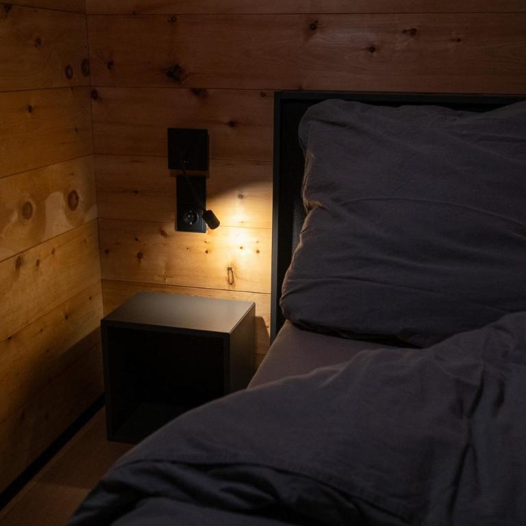Luxus Suite mit Zirbensauna, Alpenblick und Pool - Deluxe-Apartment mit 2 Schlafzimmern und Gartenblick - 15