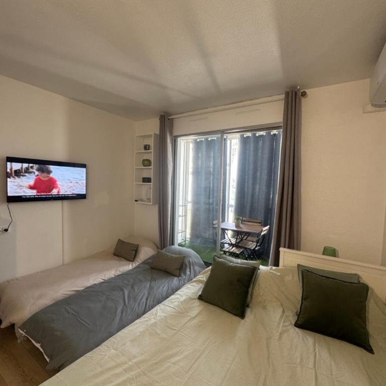 Studio climatisé avec terrasse PLAGE PORT & CENTRE à PIED Accès autonome - Estudio con terraza - 9