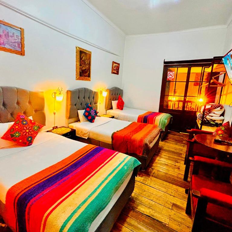 Hotel Casona Ecoterra Cusco - Habitación Triple con vistas a la ciudad - 1