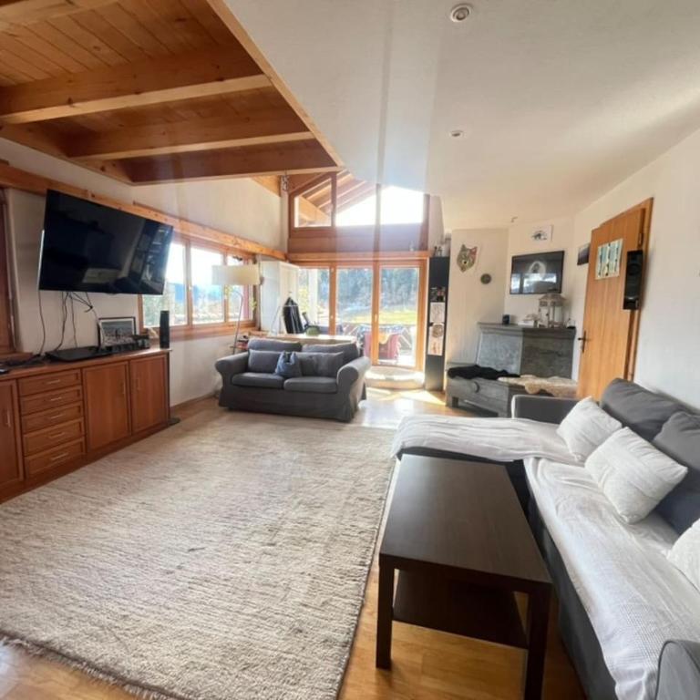 Family home in Laax with stunning views - Ferienhaus - 1