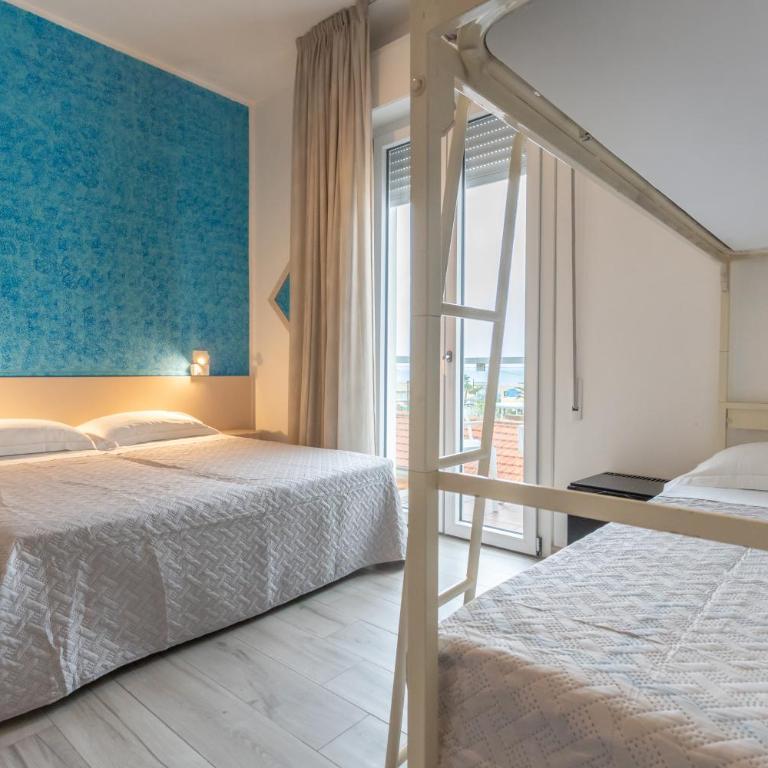 G House Rimini Spiaggia - Camera Quadrupla Comfort - 5