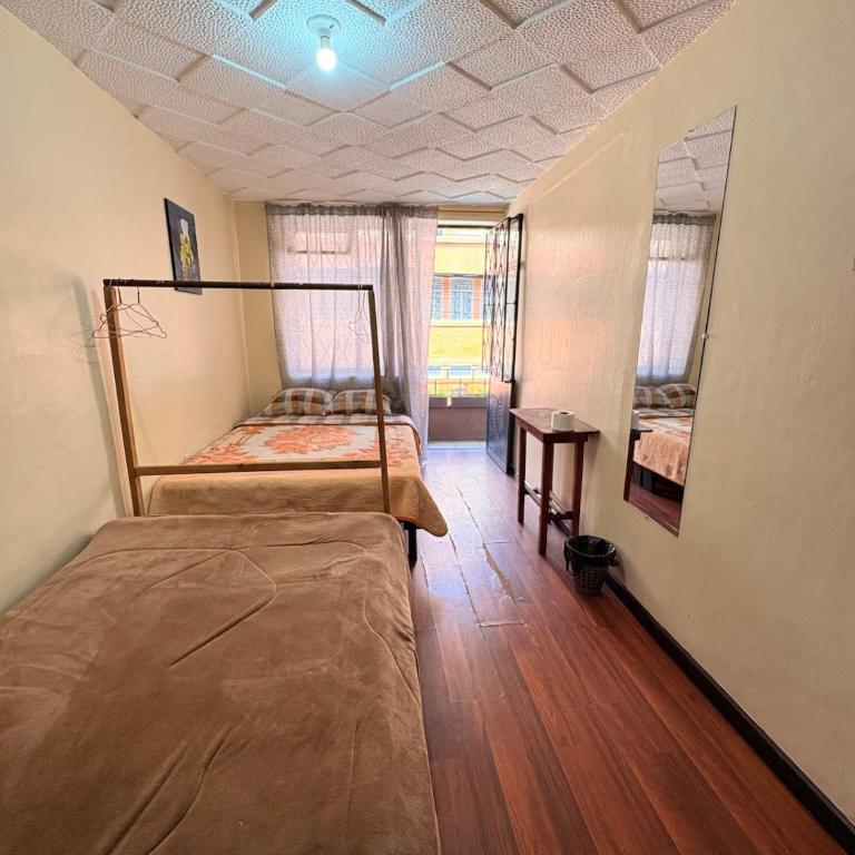 Aquí sito Nomas Es Cuenca - Habitación Triple con baño compartido - 8