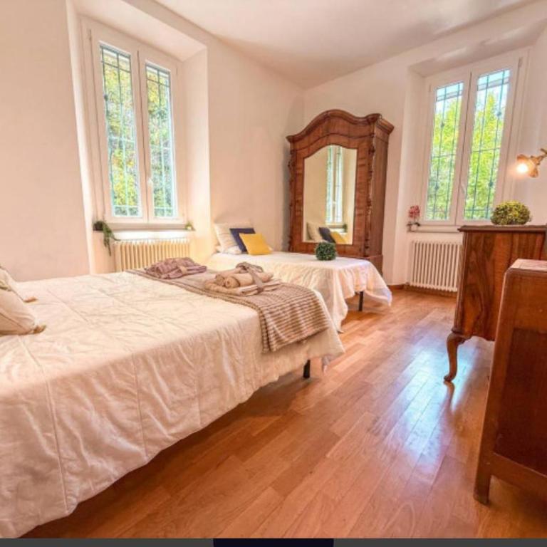 Villa Merlini - mare in pineta - Appartamento Deluxe con 2 Camere da Letto e Vista Giardino - 12