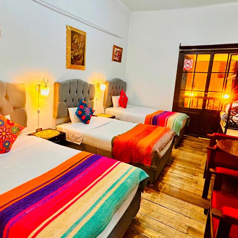 Hotel Casona Ecoterra Cusco - Habitación Triple con vistas a la ciudad - 4