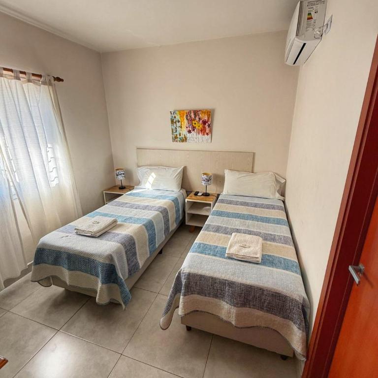 SUEÑO URBANO - Habitación Doble con baño privado - 1 o 2 camas - 6