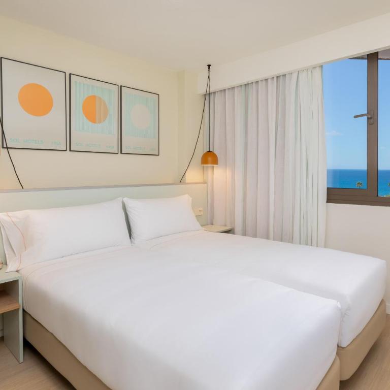 SOL by Meliá Arona Tenerife - Habitación Sol con salón y vistas al mar - 1