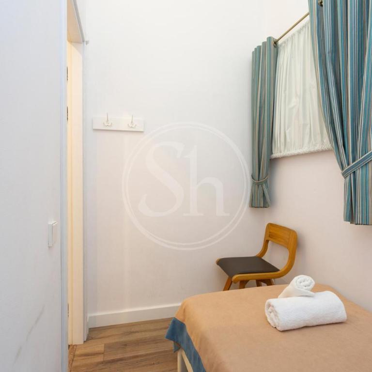 Moderno y espacioso apartamento en Calle Mallorca - Three-Bedroom Apartment - 19