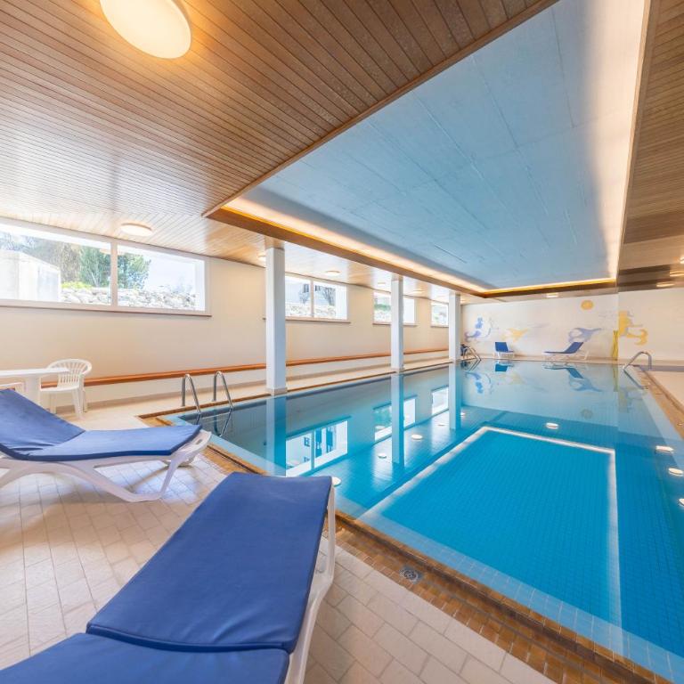 New Premium Studio with eFireplace, Pool & Sauna - Studio mit Balkon - 28