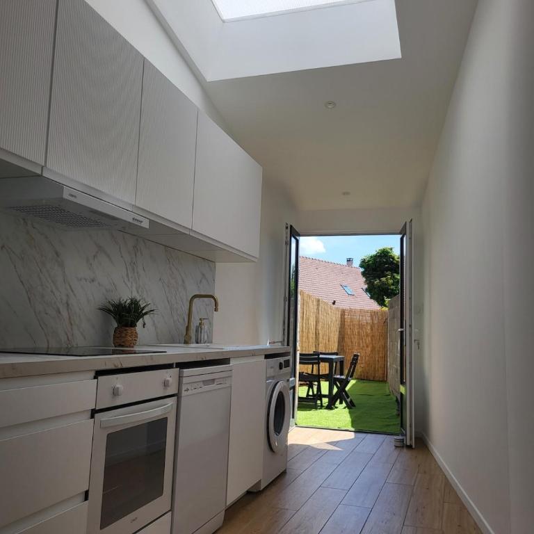 petite maison avec jardin - Appartement 1 Chambre - 13