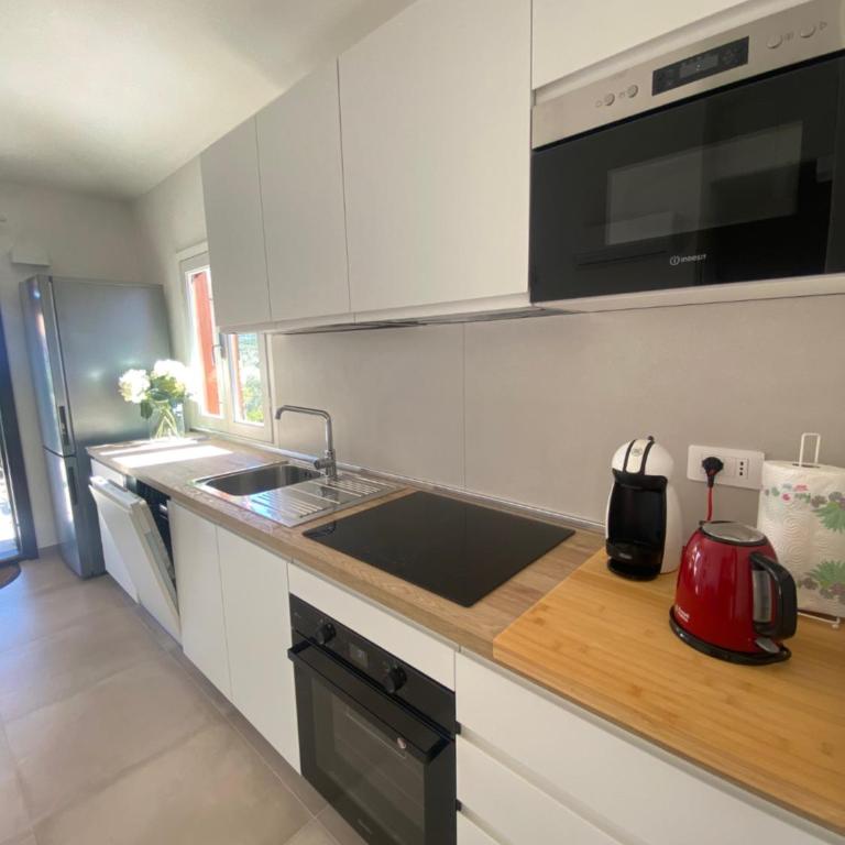 Villetta Tavolara Relax con giardino vicino al mare - Casa con 2 Camere da Letto - 13