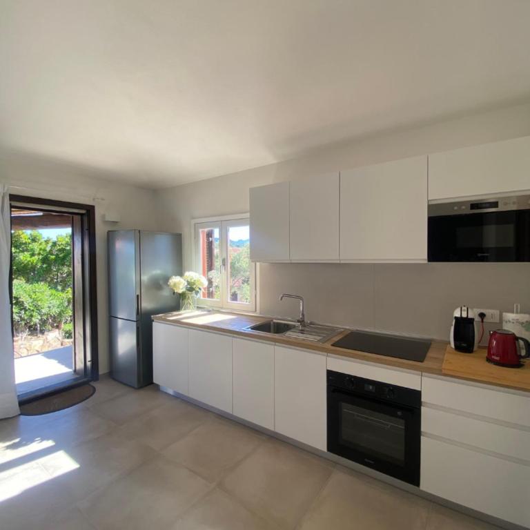 Villetta Tavolara Relax con giardino vicino al mare - Casa con 2 Camere da Letto - 12