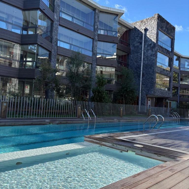Departamento, piscina temperada y estacionamiento a pasos del centro de Pucón - Apartamento de 2 dormitorios - 30
