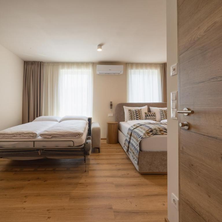 CASA PLUS - Rooms & Apartments - Chambre Familiale Supérieure - 19