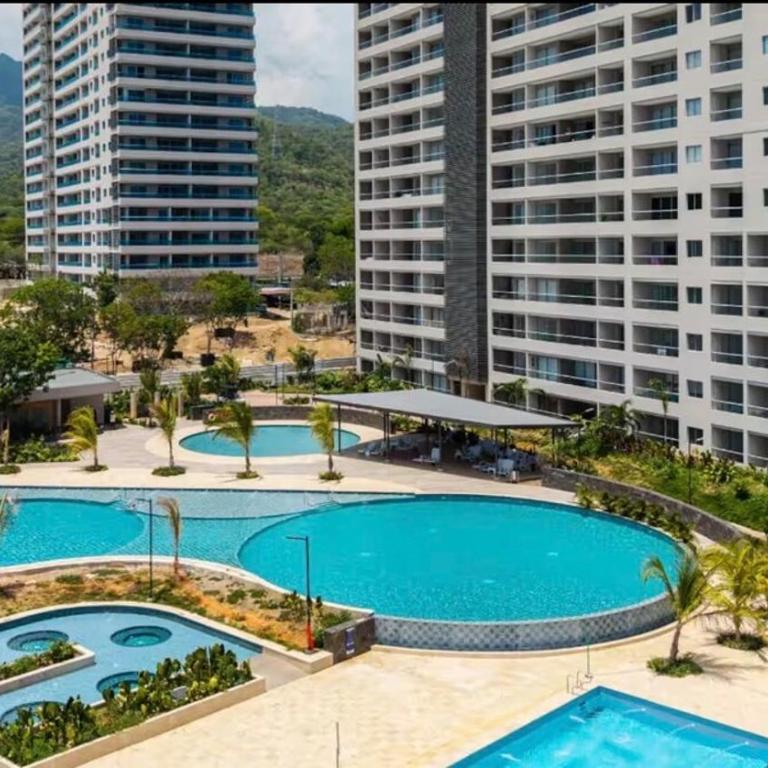 Loft moderno con piscinas tipo resort y playa - Apartamento de 1 dormitorio - 18