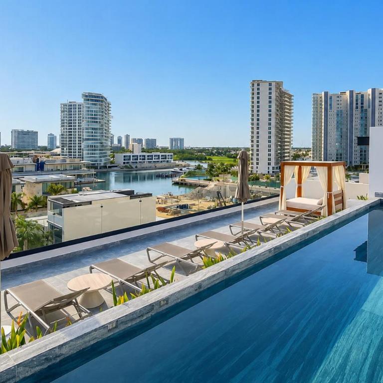 Luxury Retreat in Puerto Cancun with Rooftop Pool - Three-Bedroom Premium Apartment - 27