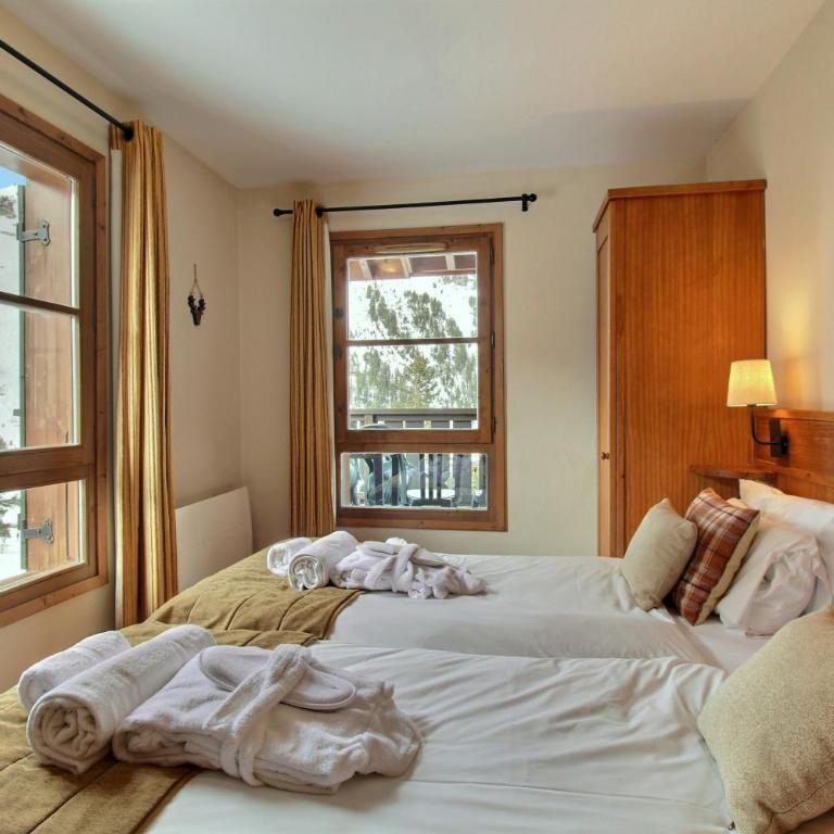 Arc 1950, Appartement 3 chambres Duplex 8 pers, Vue Montagne, Sauna, Hammam, Jacuzzi, Piscine extérieure chauffée - Three-Bedroom Apartment with Mountain View - 16