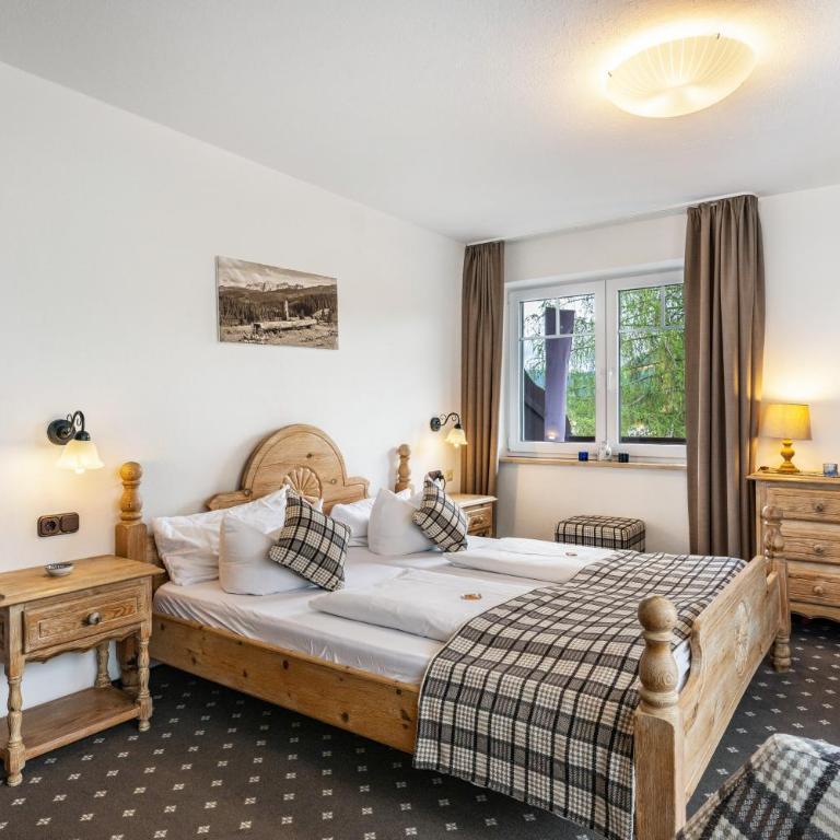 Gästehaus Tanneck mit Hallenbad - Standard Zimmer mit Queensize-Bett - 1