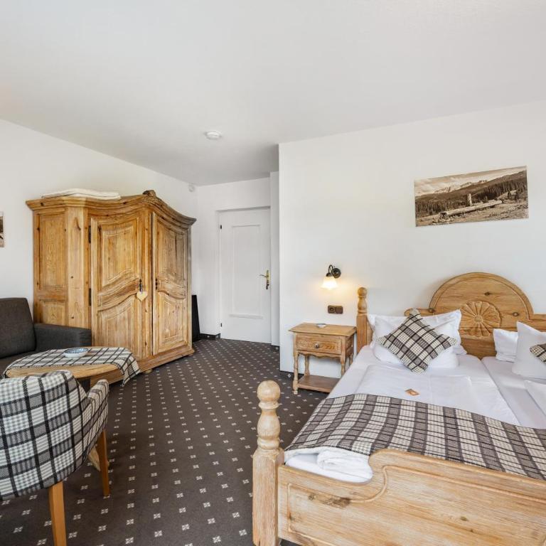 Gästehaus Tanneck mit Hallenbad - Standard Zimmer mit Queensize-Bett - 11