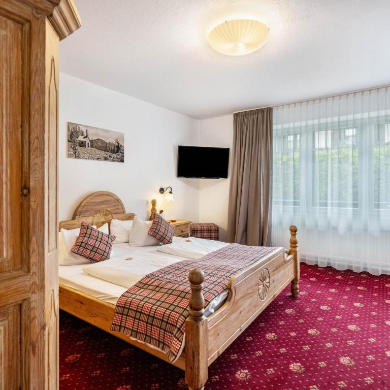 Gästehaus Tanneck mit Hallenbad - Standard Zimmer mit Queensize-Bett - 7