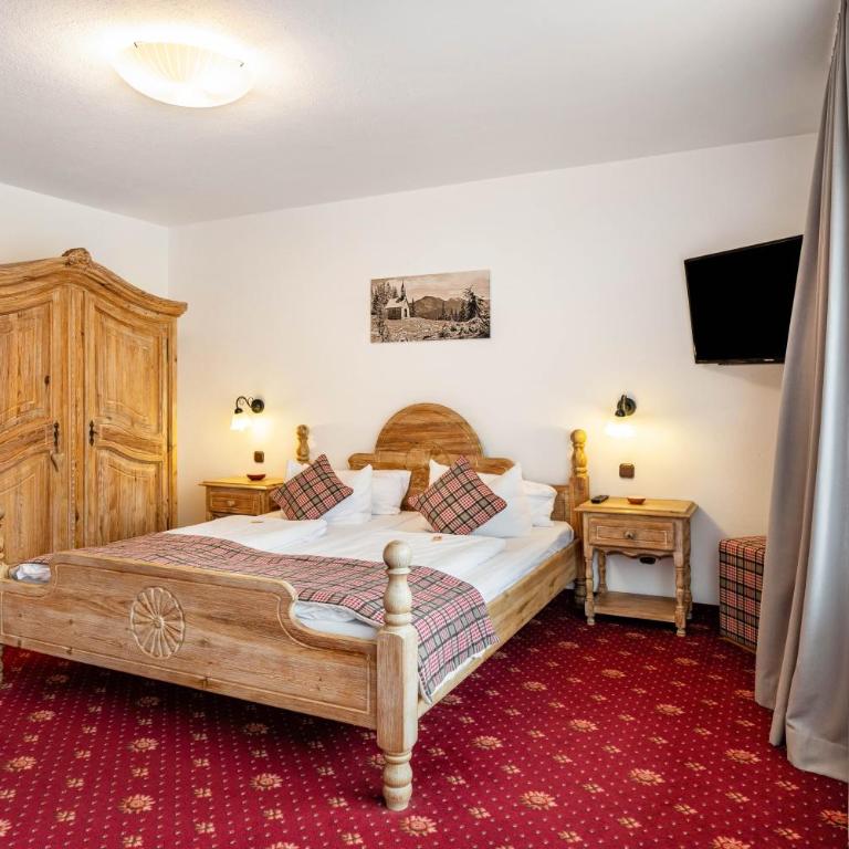 Gästehaus Tanneck mit Hallenbad - Standard Zimmer mit Queensize-Bett - 1
