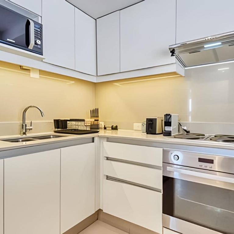 Espacioso 3BR y 2 Terrazas Cerca de Parques - Apartamento Deluxe de 3 dormitorios - 10