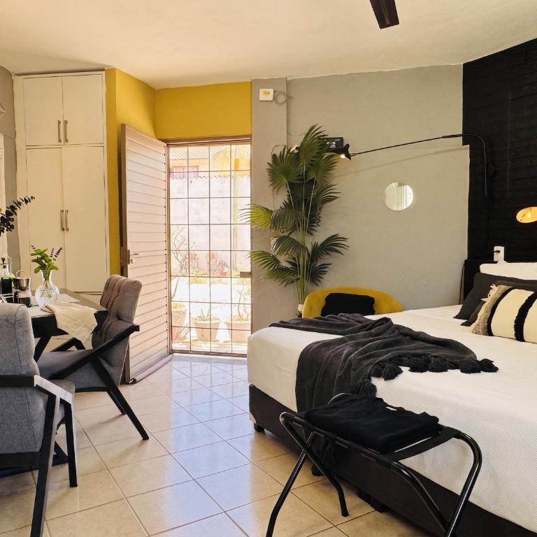 Polly's Home Aralias Boutique GuestHouse & PrivateSuites - Habitación Deluxe con cama extragrande - 11