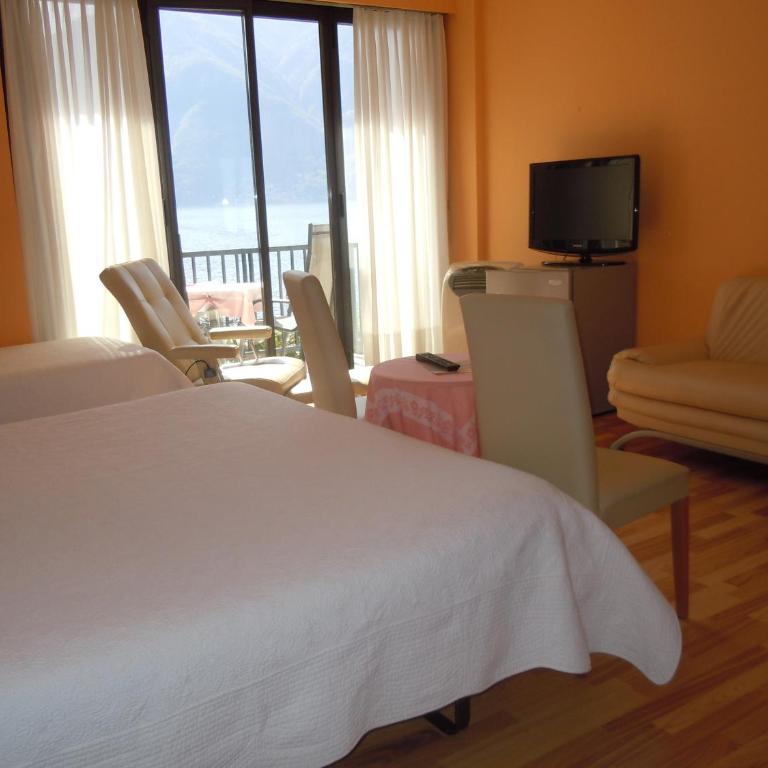 Swiss Lodge Nassa Garni - Camera Tripla Standard con Vista Lago e Balcone - 14