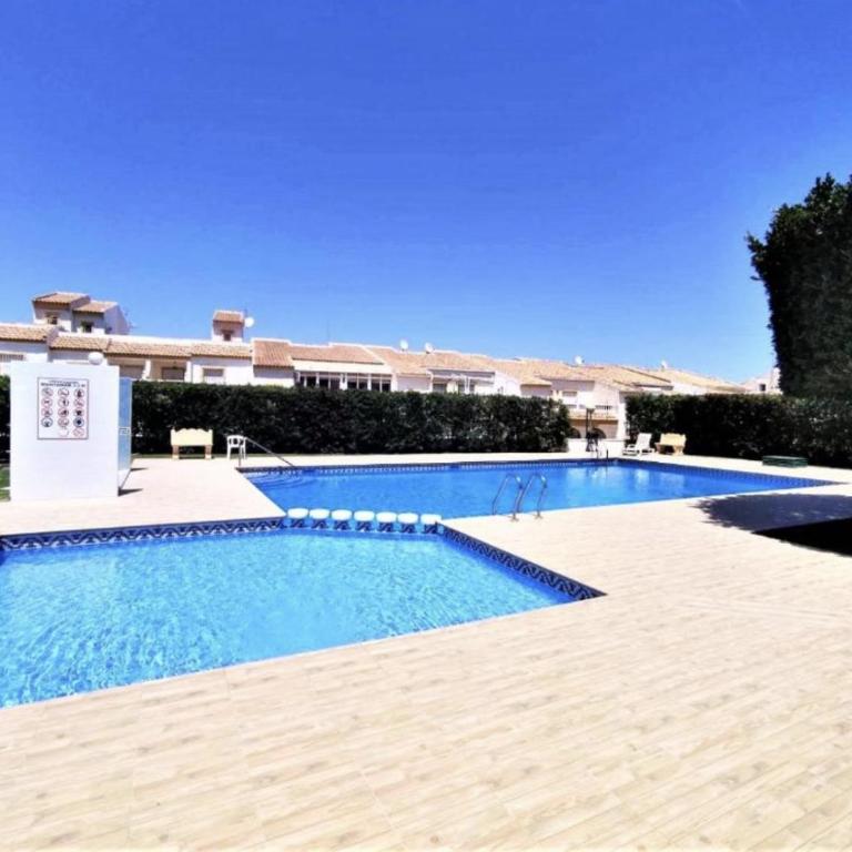 Spacious 3-Bedroom Home with Pool and Parking - Three-Bedroom Vacation Home - 1