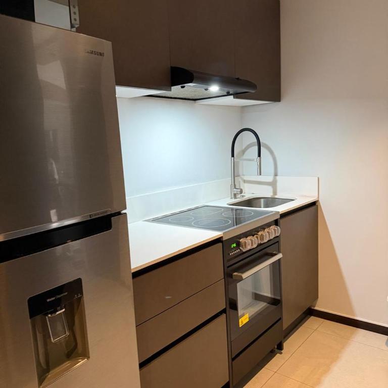 Apartment for 6 people with a pool, gym, coworking space, and parking - Three-Bedroom Apartment - 12