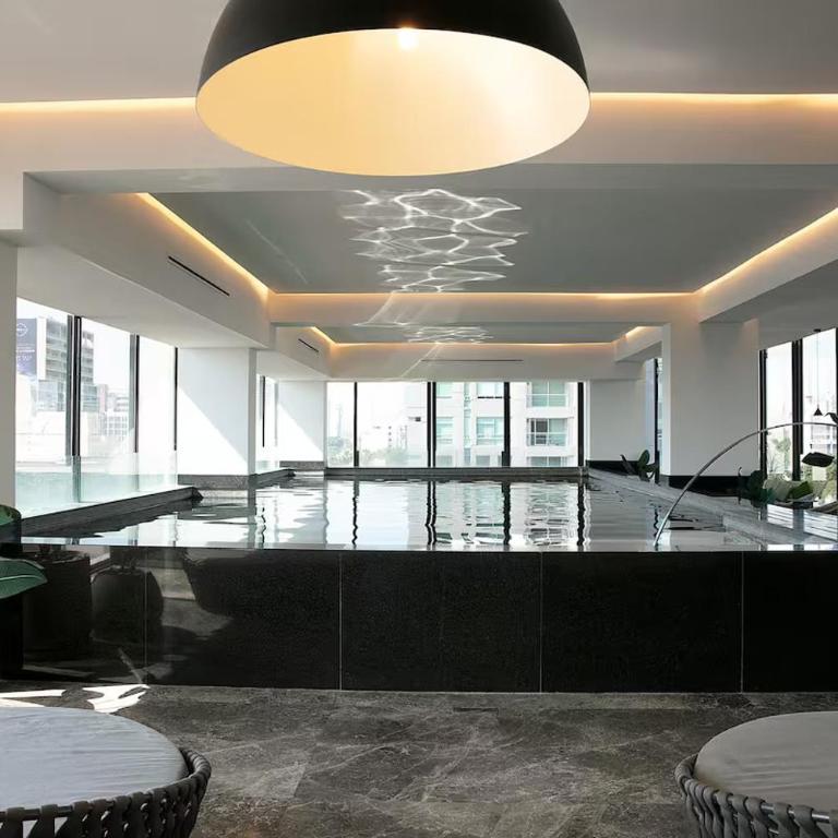 Apartment for 6 people with a pool, gym, coworking space, and parking - Three-Bedroom Apartment - 26