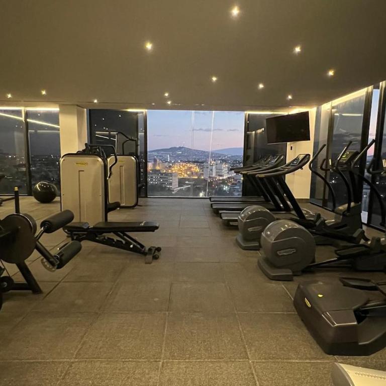 Apartment for 6 people with a pool, gym, coworking space, and parking - Three-Bedroom Apartment - 39