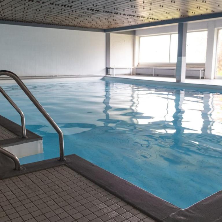 Luxus Suite mit Zirbensauna, Alpenblick und Pool - Deluxe-Apartment mit 2 Schlafzimmern und Gartenblick - 26