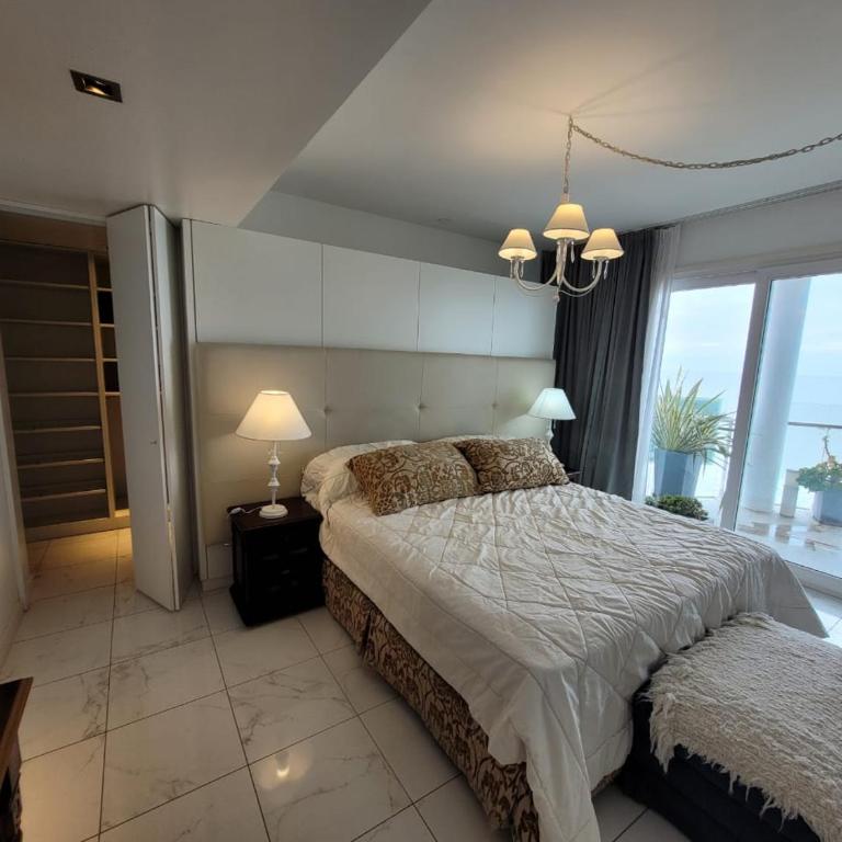 Check and Home - Varese - 6 Huéspedes De Lujo con Vista al Mar - Three-Bedroom Apartment with Sea View - 39