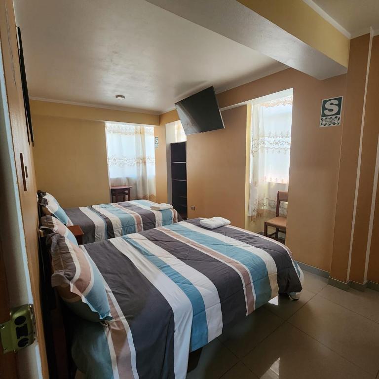 Hostal Capac - Habitación Doble - 2 camas dobles - 2