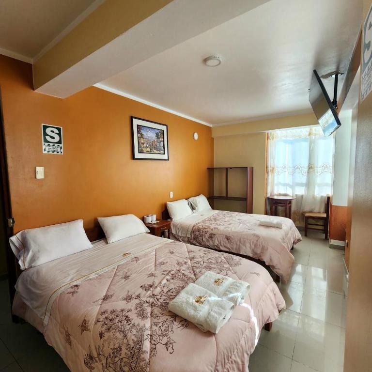 Hostal Capac - Habitación Doble - 2 camas dobles - 3