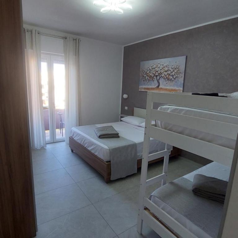 La Pilozza Guest Rooms - Camera Quadrupla con Vista Mare - 2