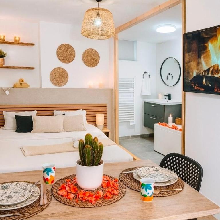 Suite Tropicale avec baignoire balnéo Saint-Étienne - Appartamento con 1 Camera da Letto - 4