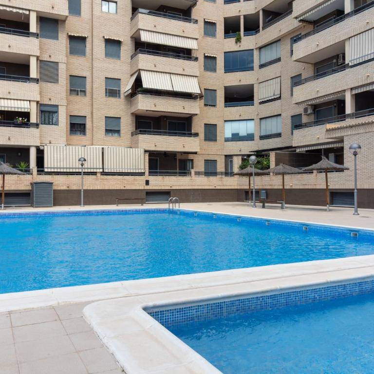 Global Vacacional: Apartamento familiar con piscina y terraza en Canet - Apartment - 3