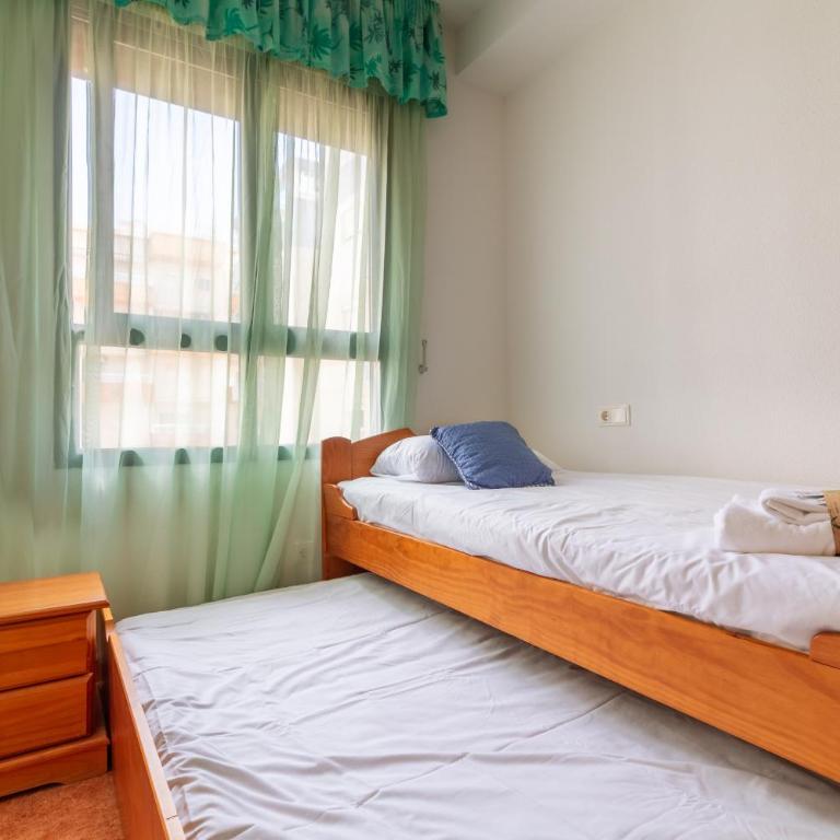 Global Vacacional: Apartamento familiar con piscina y terraza en Canet - Apartment - 16