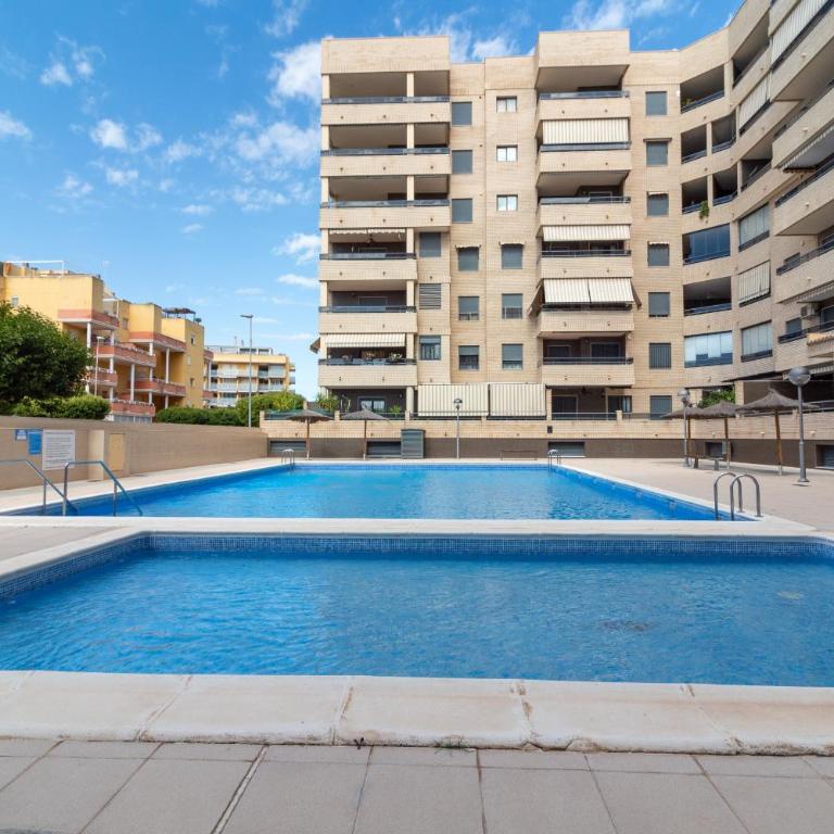 Global Vacacional: Apartamento familiar con piscina y terraza en Canet - Apartment - 20